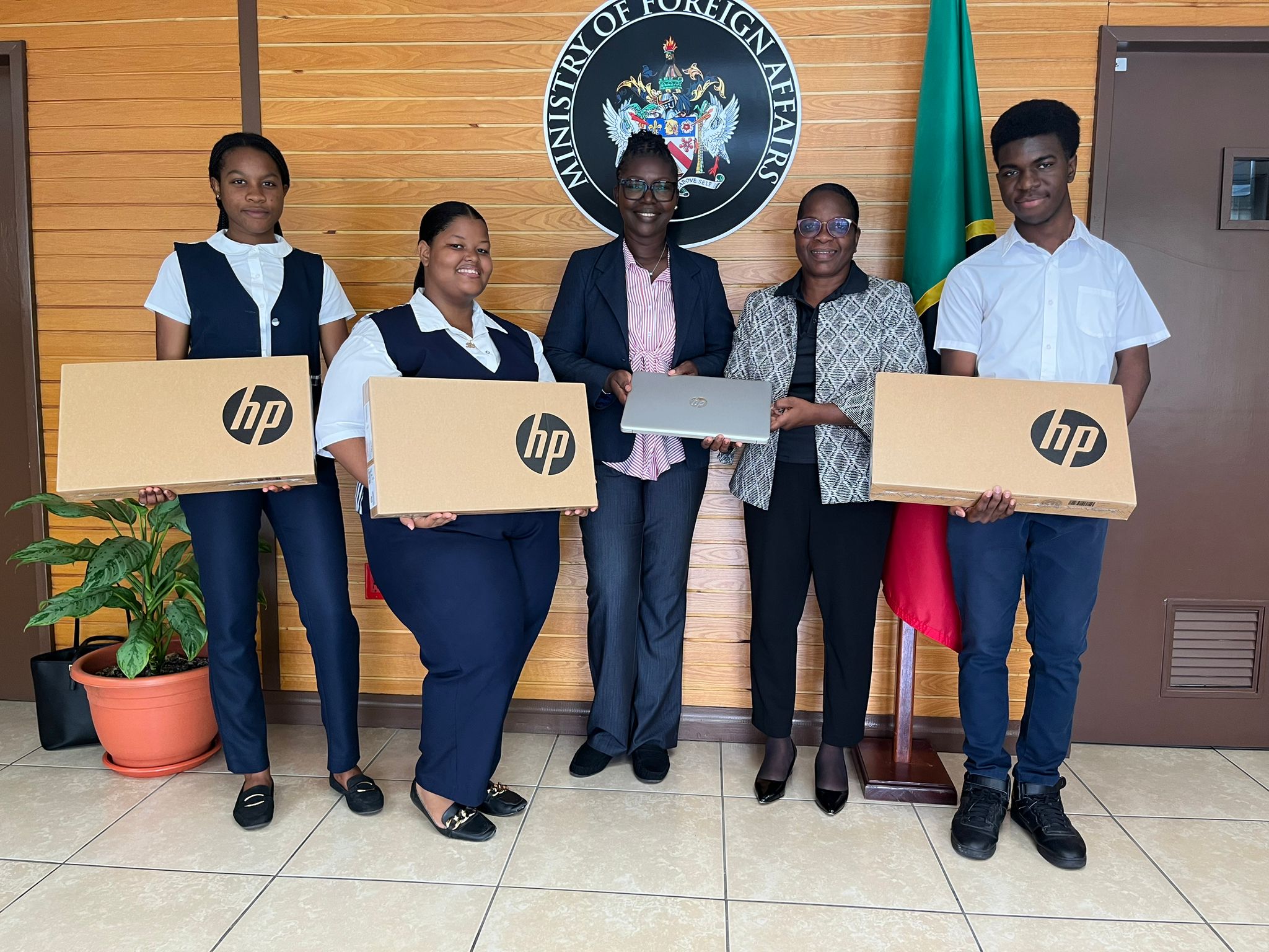 CFBC Students Receive Laptops Donated by H.E. Dr Kevin Isaac